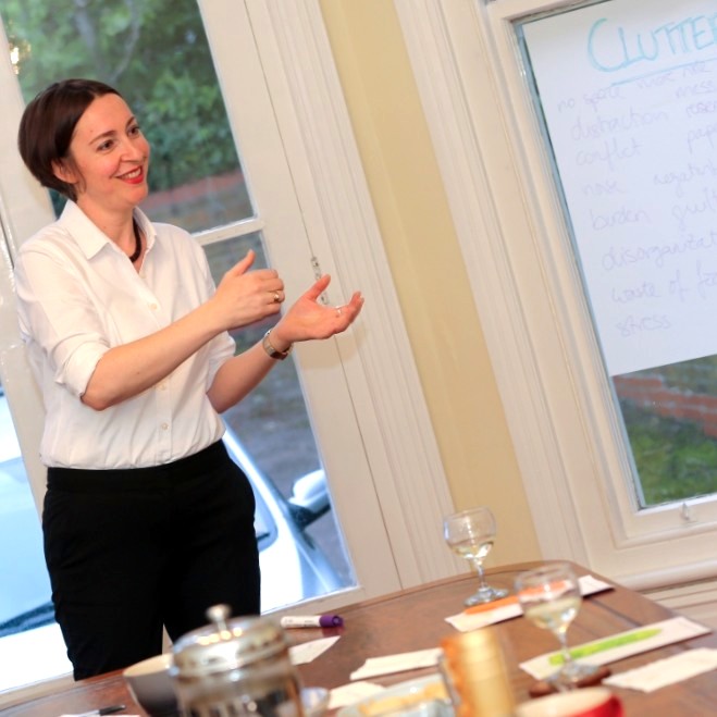 Ingrid Pope delivering a workshop to a team